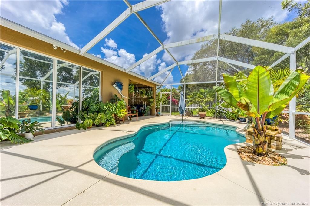 Photo of 2243 SE Blossom Road, Port Saint Lucie, FL 34952 (MLS # M20040283)