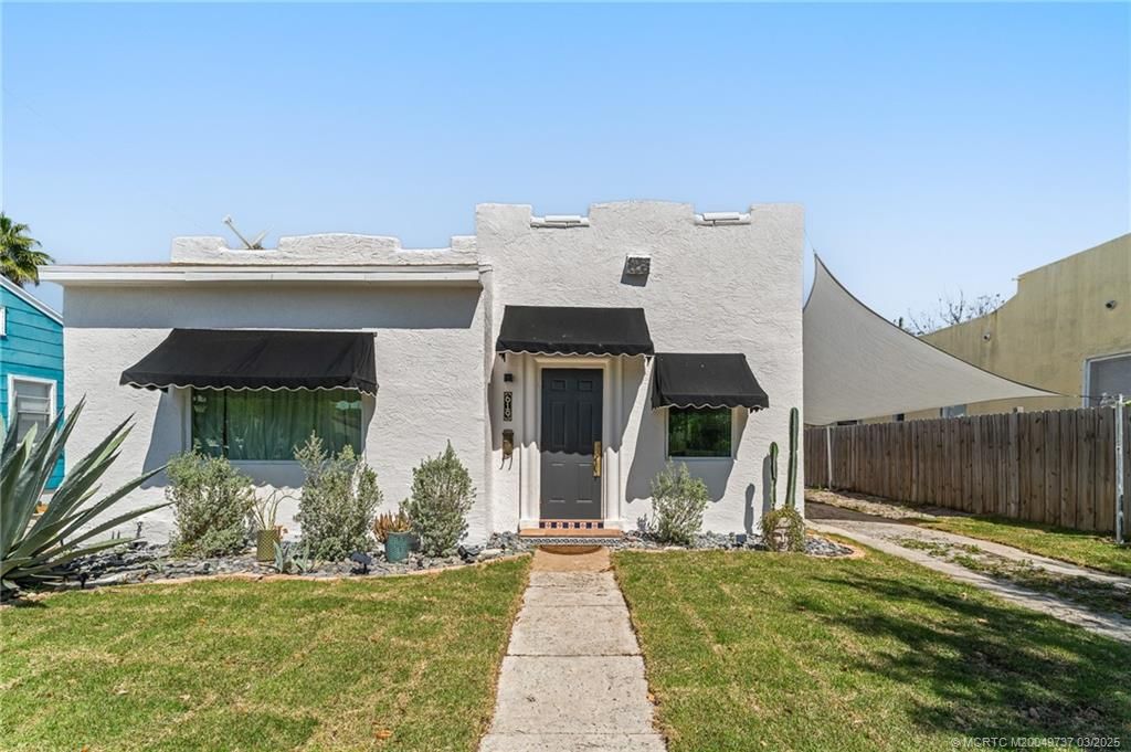Photo of 619 Macy Street, West Palm Beach, FL 33405 (MLS # M20049737)