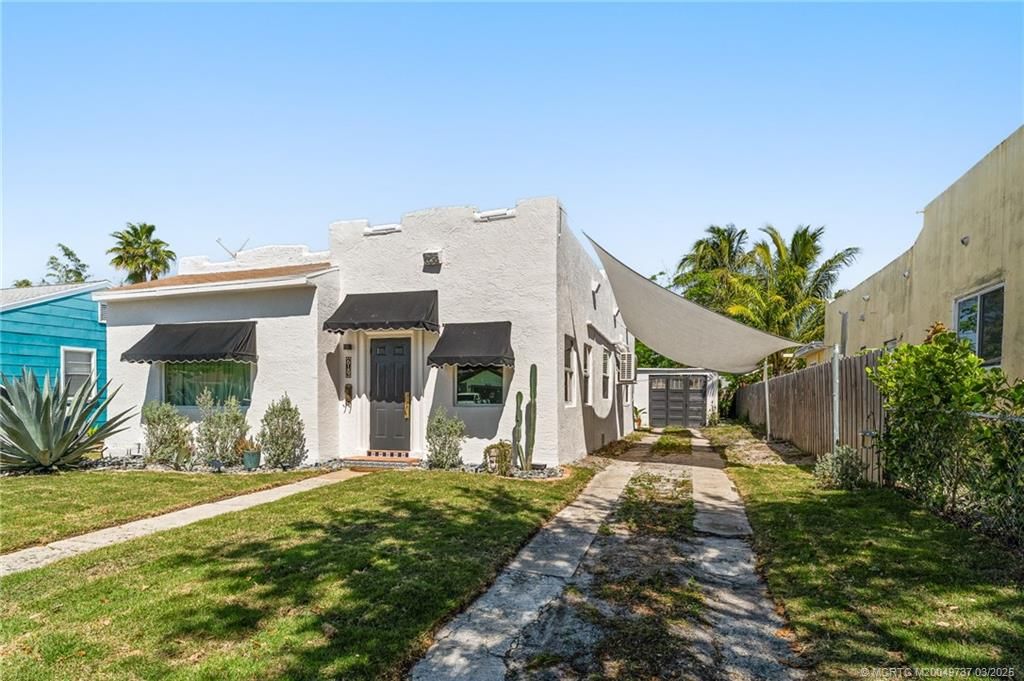 Photo of 619 Macy Street, West Palm Beach, FL 33405 (MLS # M20049737)