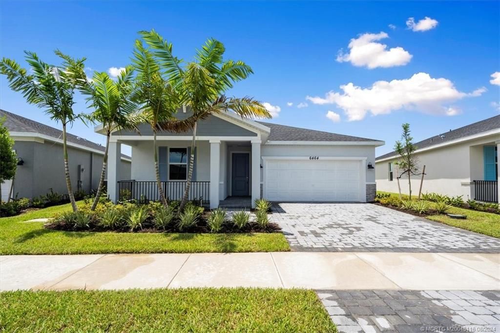 Photo of 6464 NW Cloverdale Avenue, Port Saint Lucie, FL 34987 (MLS # M20046116)
