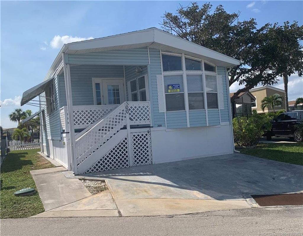 Photo of 300 Nettles Boulevard, Jensen Beach, FL 34957 (MLS # M20036040)