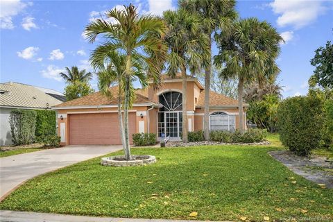 Photo of 861 NW Waterlily Place, Jensen Beach, FL 34957 (MLS # M20054390)