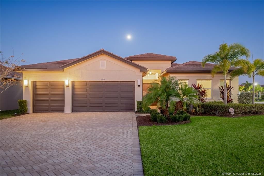 Photo of 11844 SW Sailfish Isles Way, Port Saint Lucie, FL 34987 (MLS # M20051765)