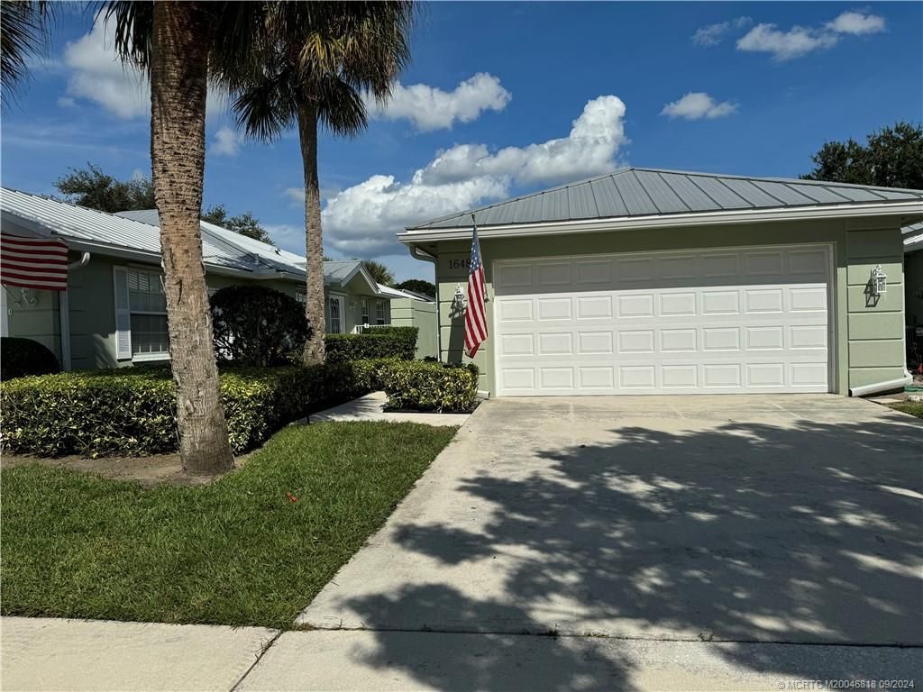 Photo of 1648 SW Waterfall Boulevard, Palm City, FL 34990 (MLS # M20046818)