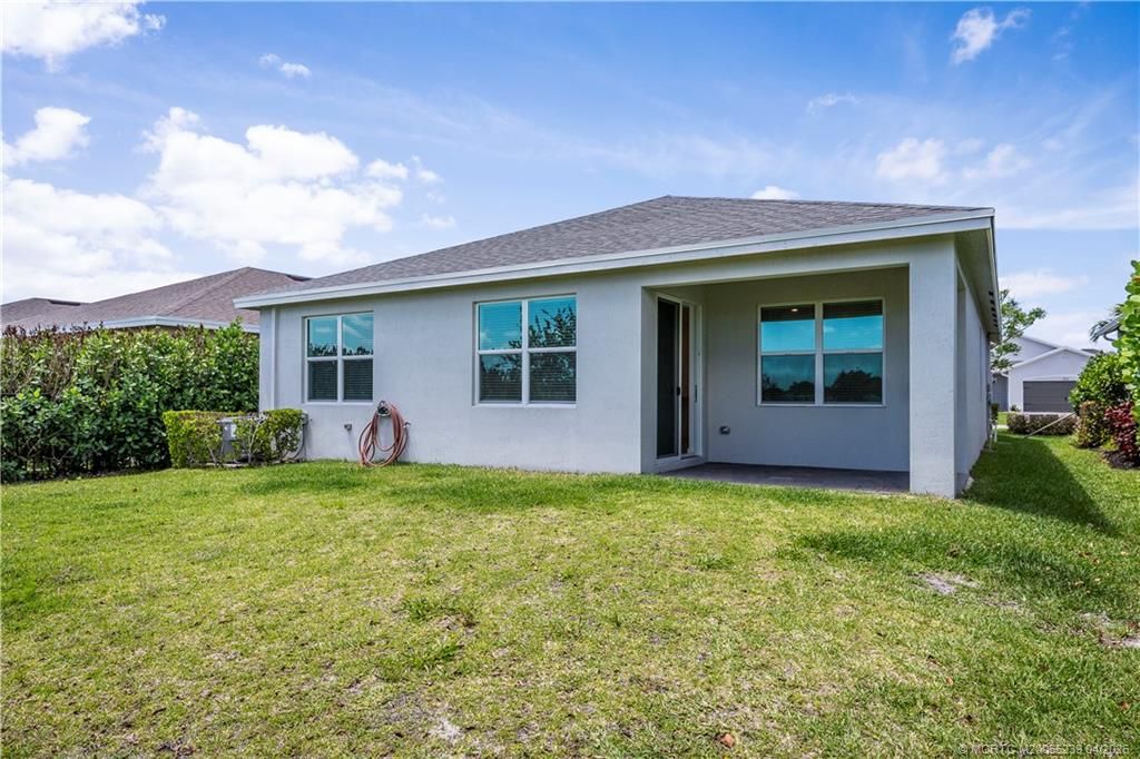 Photo of 2730 NE Breezeway Circle, Jensen Beach, FL 34957 (MLS # M20055239)