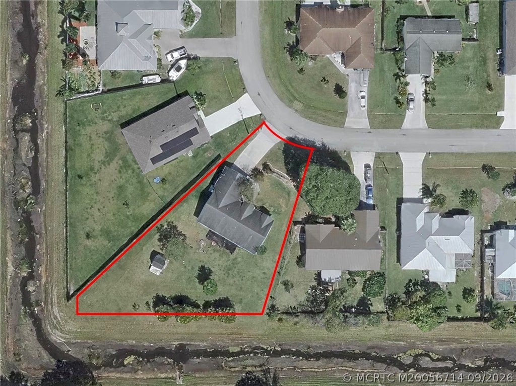 Photo of 2298 SW Jay Avenue, Port Saint Lucie, FL 34953 (MLS # M20056714)