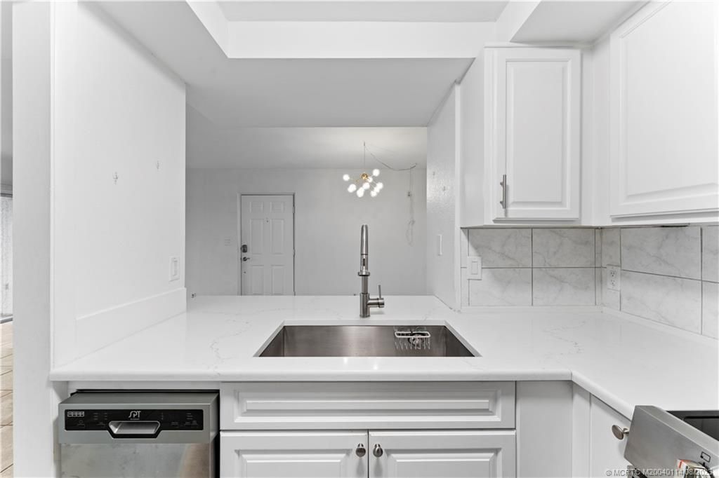 Photo of 1500 SE Royal Green Circle #104, Port Saint Lucie, FL 34952 (MLS # M20040114)