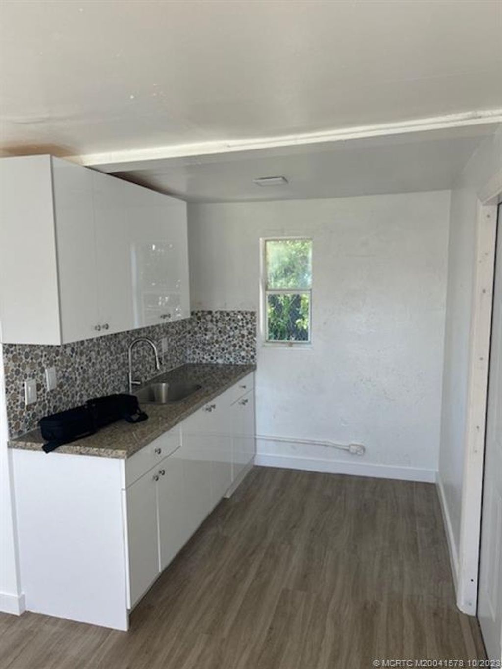 Photo of 2516 Avenue L, Fort Pierce, FL 34947 (MLS # M20041578)