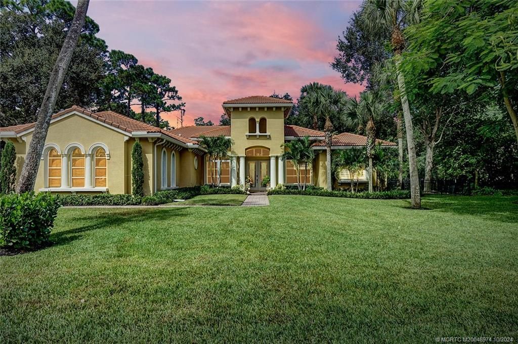 Photo of 8220 SW Cattleya Drive, Stuart, FL 34997 (MLS # M20046974)