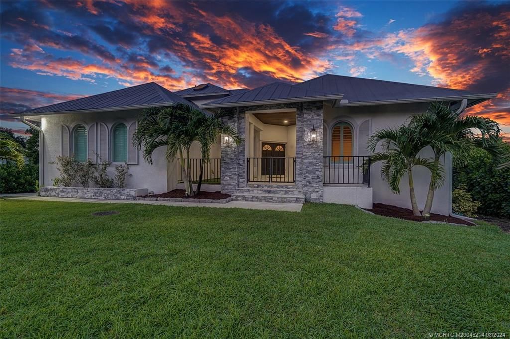 Photo of 921 SW Pine Tree Lane, Palm City, FL 34990 (MLS # M20045214)