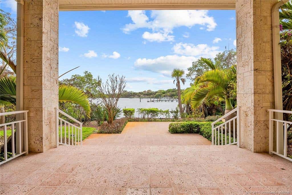 Photo of 12198 Riverbend Lane, Port Saint Lucie, FL 34984 (MLS # M20054859)