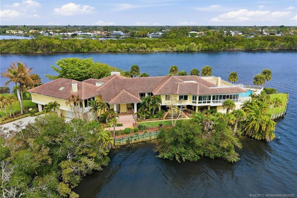 Photo of 12198 Riverbend Lane, Port Saint Lucie, FL 34984 (MLS # M20054859)
