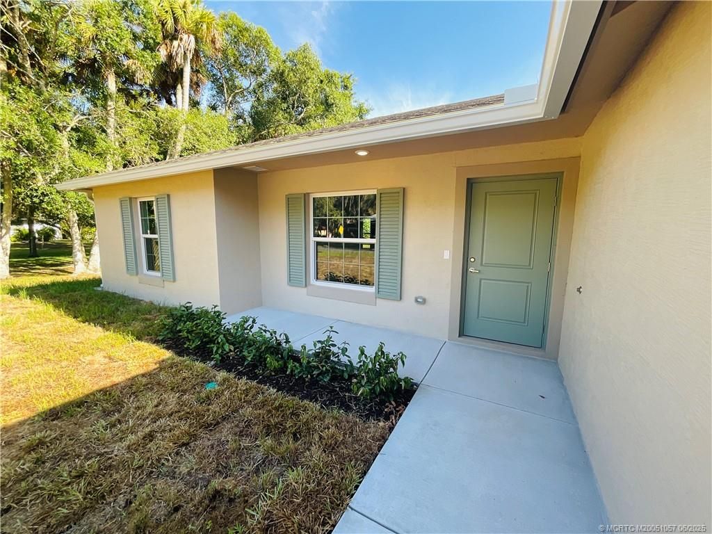 Photo of 7702 Lakeland Boulevard, Fort Pierce, FL 34951 (MLS # M20051057)