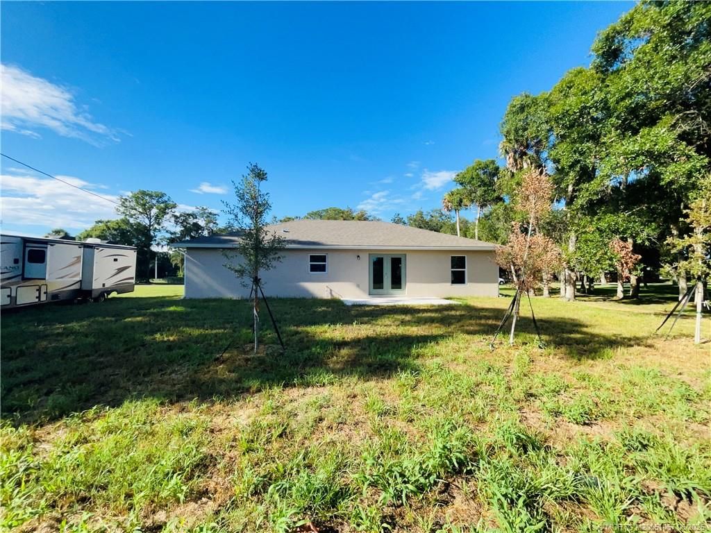 Photo of 7702 Lakeland Boulevard, Fort Pierce, FL 34951 (MLS # M20051057)