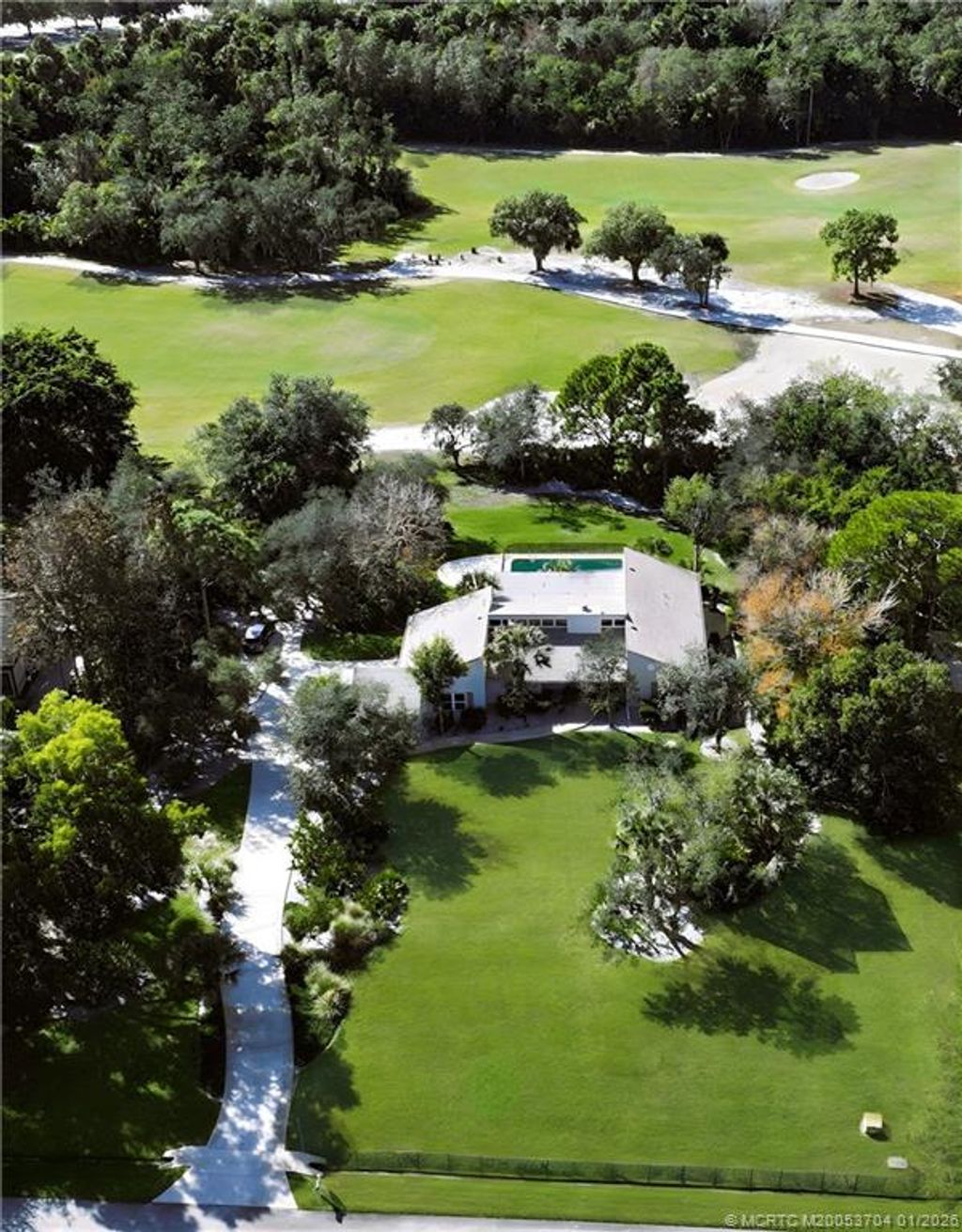 Photo of 1672 SW Sandtrap Crescent, Palm City, FL 34990 (MLS # M20053704)