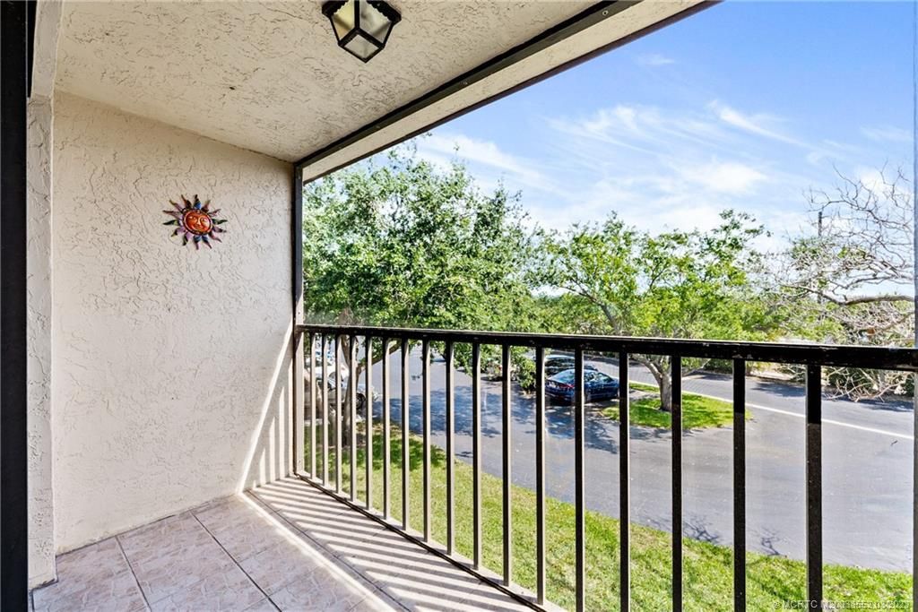 Photo of 2069 NE Collins Circle #7-90, Jensen Beach, FL 34957 (MLS # M20038552)