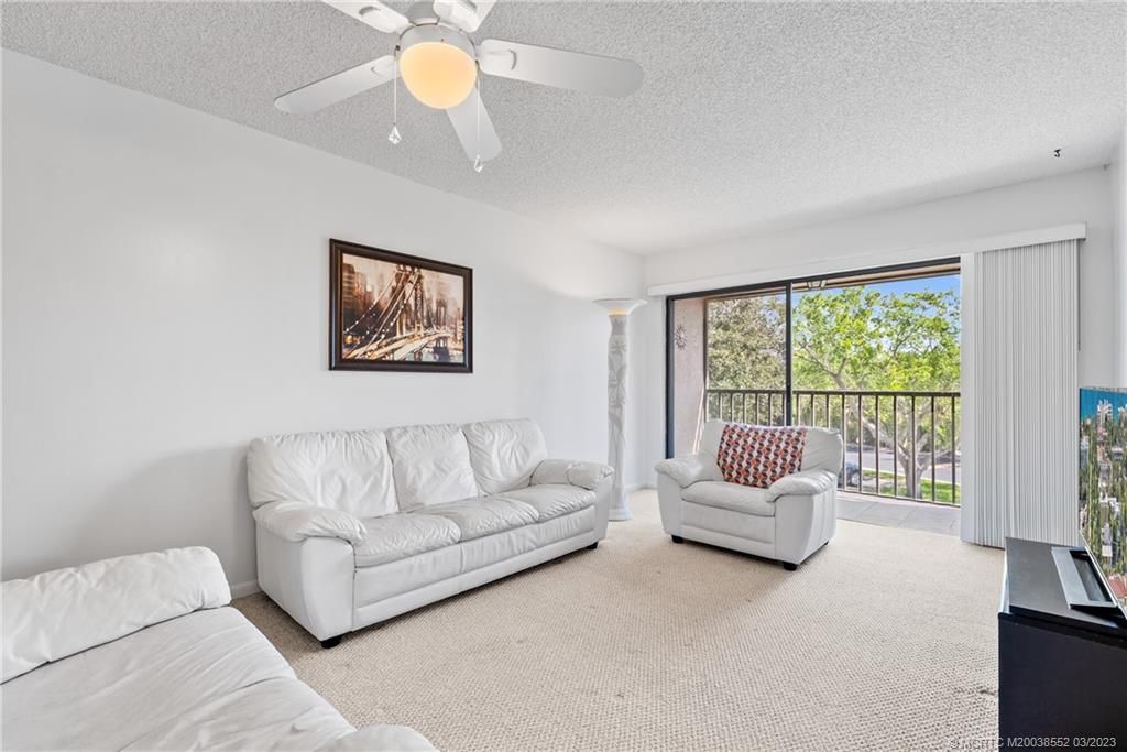 Photo of 2069 NE Collins Circle #7-90, Jensen Beach, FL 34957 (MLS # M20038552)