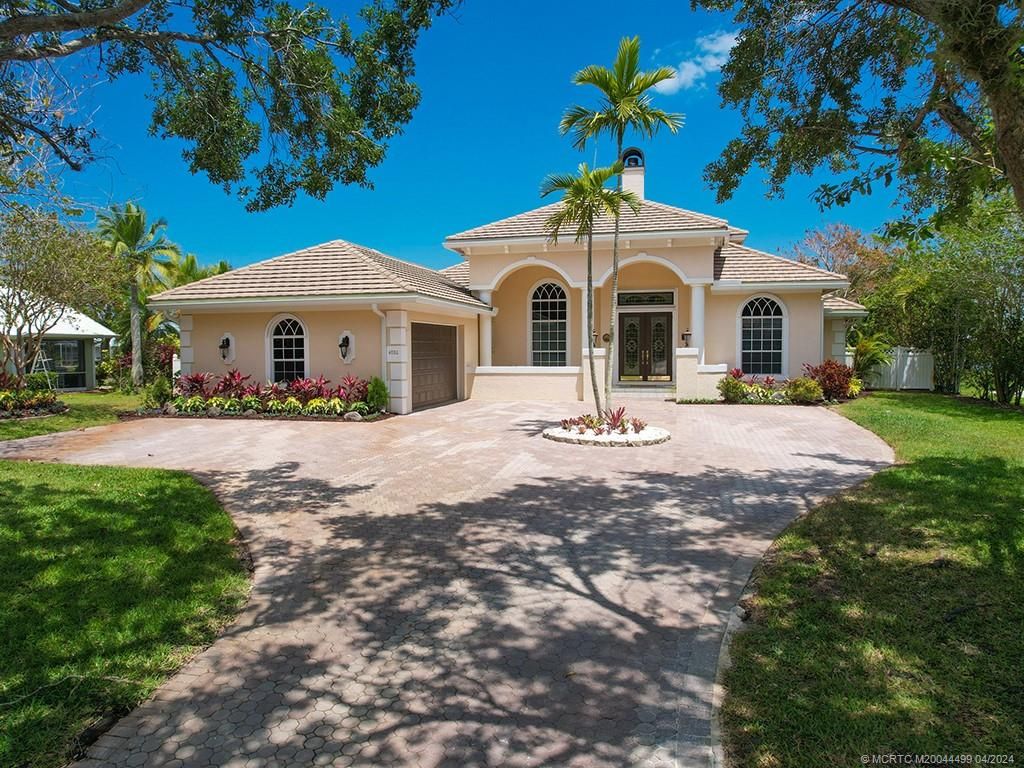 Photo of 4880 SW Lake Grove Circle, Palm City, FL 34990 (MLS # M20044499)