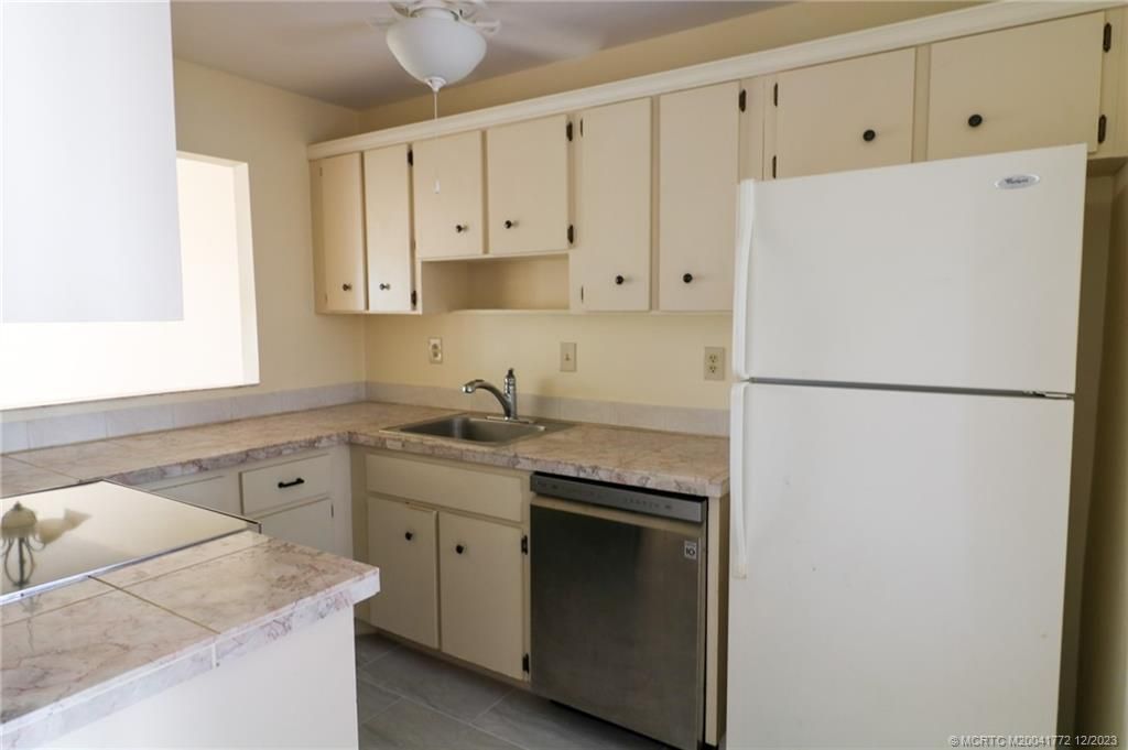 Photo of 5463 SE Miles Grant Road #216, Stuart, FL 34997 (MLS # M20041772)