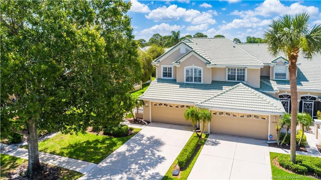 Photo of 1676 SW Harbour Isles Circle #97, Port Saint Lucie, FL 34986 (MLS # M20040027)