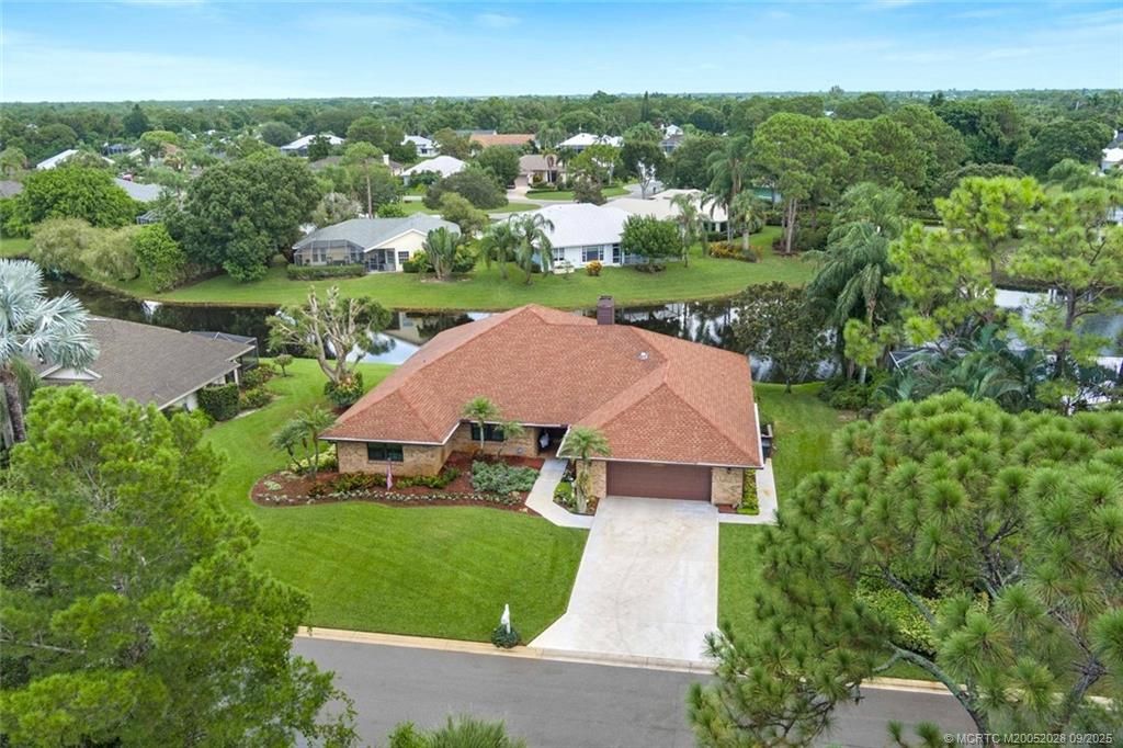 Photo of 1919 SW Little Oak Trail, Palm City, FL 34990 (MLS # M20052028)