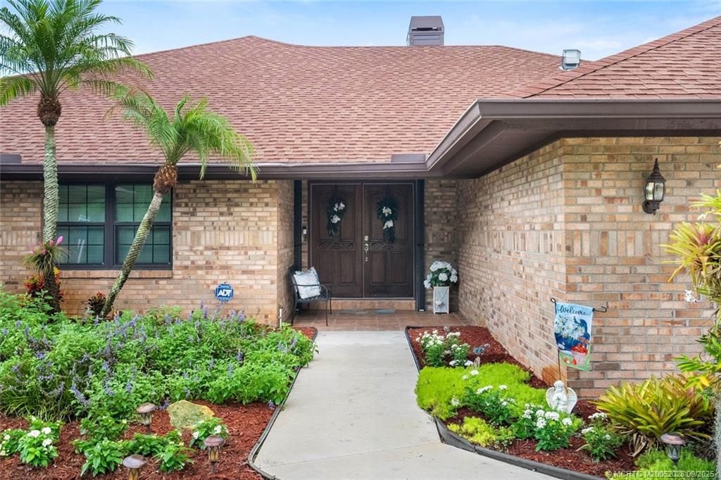 Photo of 1919 SW Little Oak Trail, Palm City, FL 34990 (MLS # M20052028)