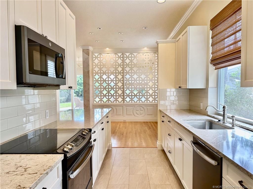 Photo of 2696 SW Greenwich Way, Palm City, FL 34990 (MLS # M20041754)