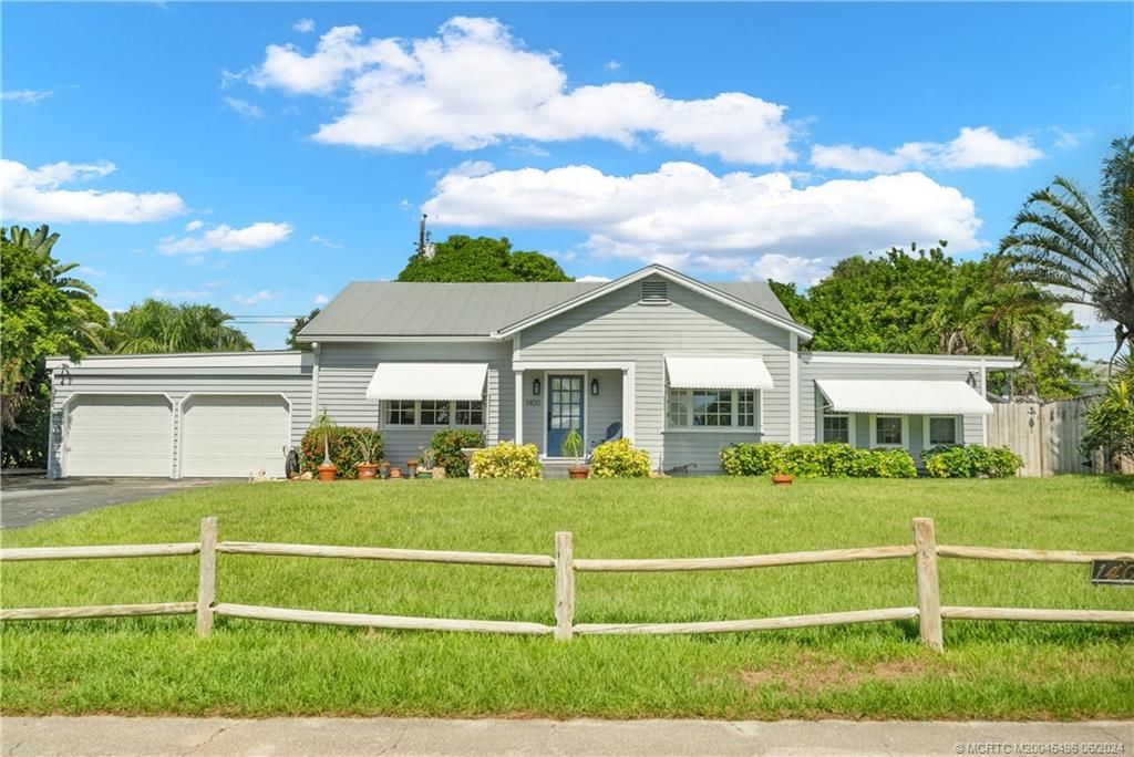 Photo of 1400 NE Eleanor Avenue, Jensen Beach, FL 34957 (MLS # M20045496)