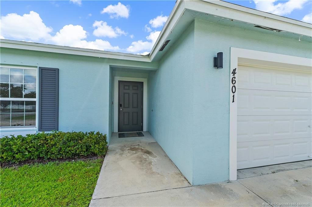 Photo of 4601 SW Scanavino Street, Port Saint Lucie, FL 34953 (MLS # M20051885)