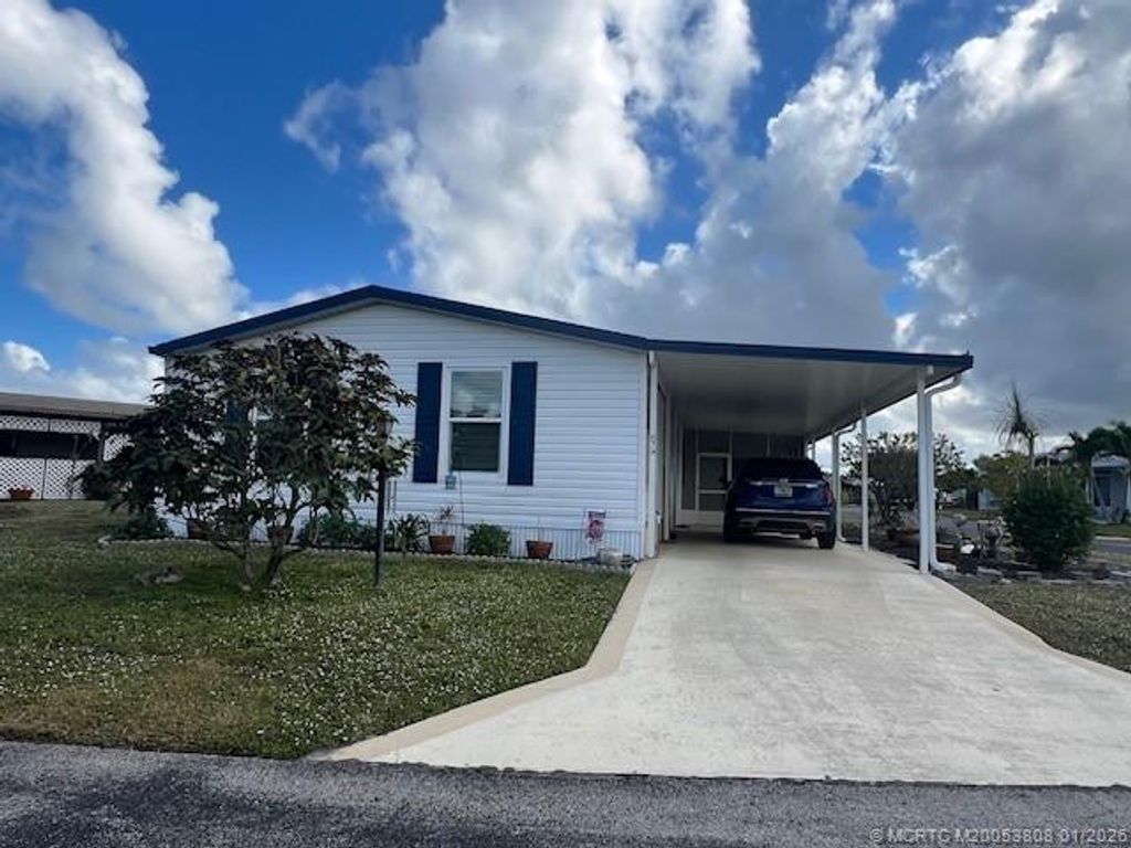 Photo of 874 Sun Disk Place, Boynton Beach, FL 33436 (MLS # M20053808)