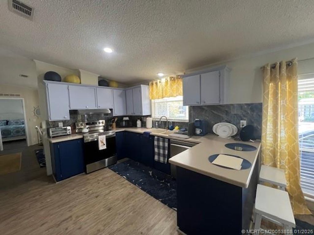 Photo of 874 Sun Disk Place, Boynton Beach, FL 33436 (MLS # M20053808)