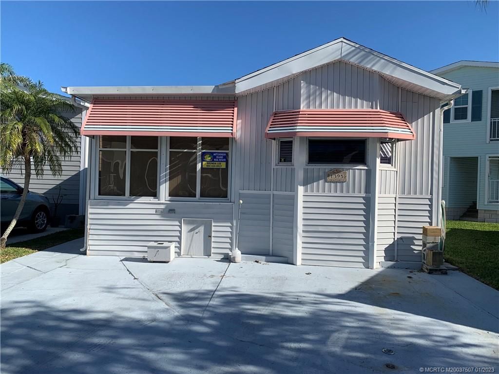 Photo of 1395 Nettles Boulevard, Jensen Beach, FL 34957 (MLS # M20037507)