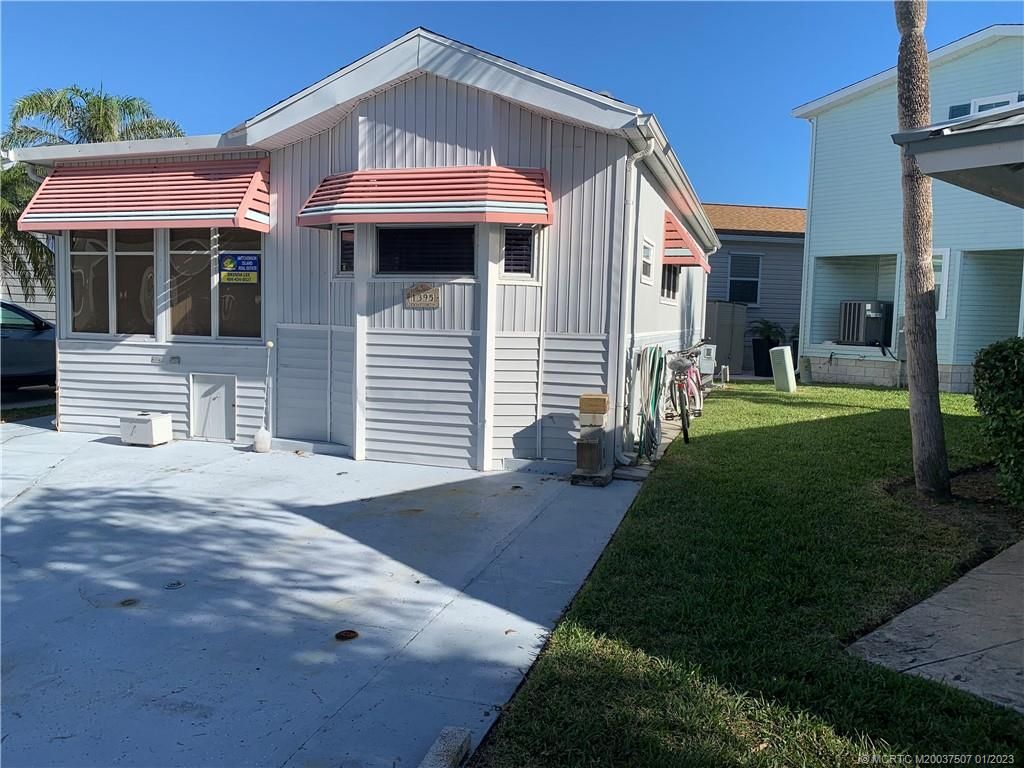 Photo of 1395 Nettles Boulevard, Jensen Beach, FL 34957 (MLS # M20037507)