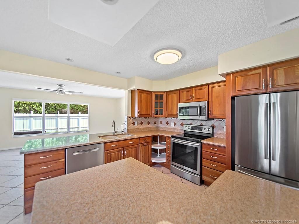 Photo of 8801 SE Sandcastle Circle, Hobe Sound, FL 33455 (MLS # M20045011)