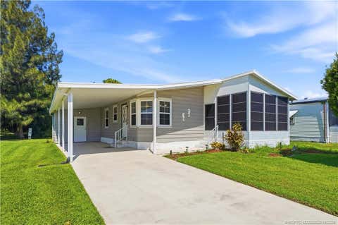 Photo of 2917 Fiddlewood Circle, Fort Pierce, FL 34952 (MLS # M20056608)