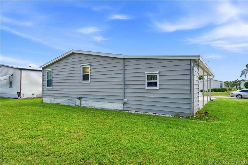Photo of 2917 Fiddlewood Circle, Fort Pierce, FL 34952 (MLS # M20056608)