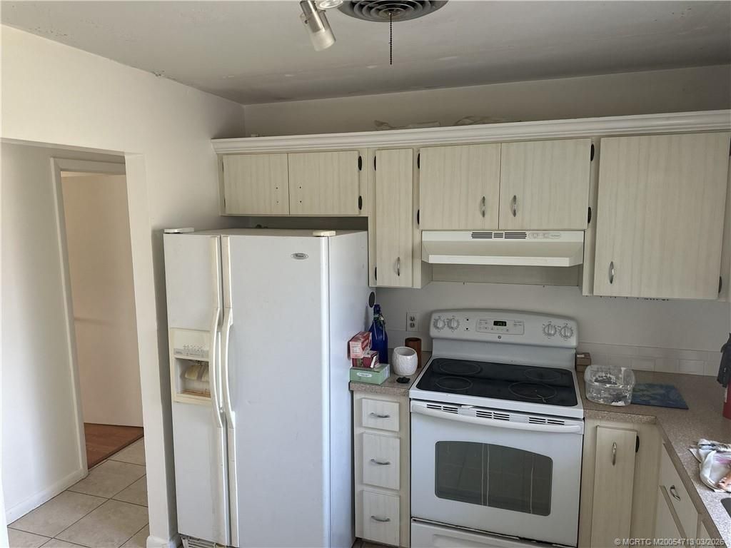 Photo of 1701 NE 16th Drive, Jensen Beach, FL 34957 (MLS # M20054713)