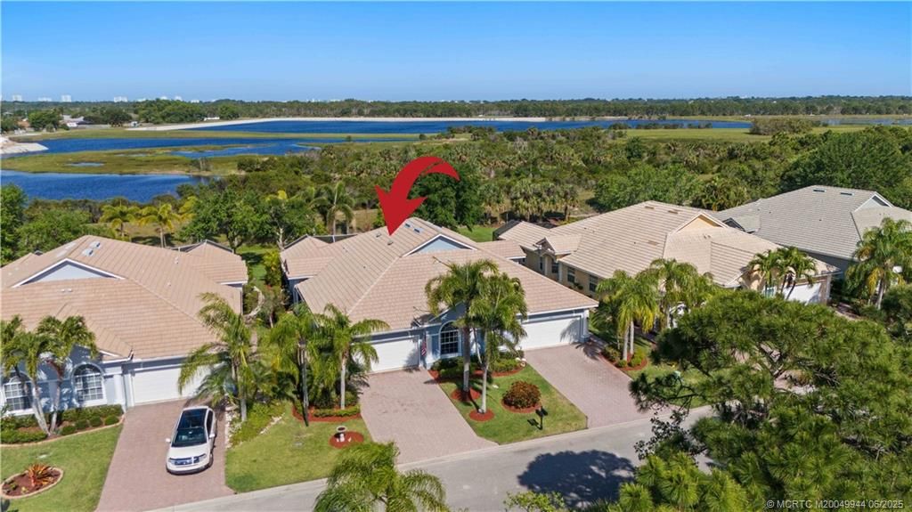 Photo of 551 NW Red Pine Way, Jensen Beach, FL 34957 (MLS # M20049944)