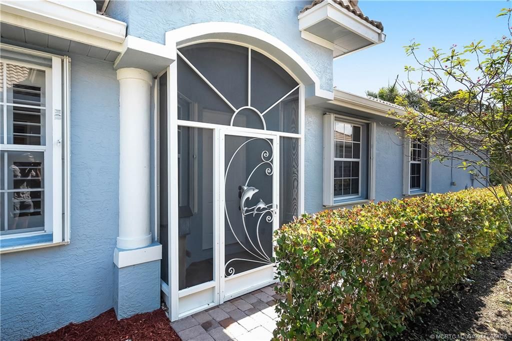 Photo of 551 NW Red Pine Way, Jensen Beach, FL 34957 (MLS # M20049944)