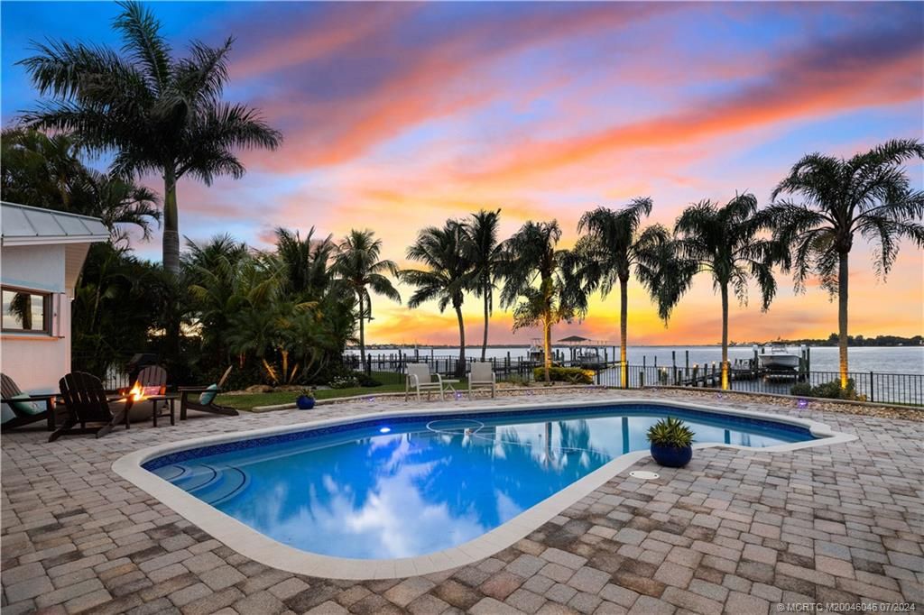 Photo of 1200 SW Dyer Point Road, Palm City, FL 34990 (MLS # M20046046)