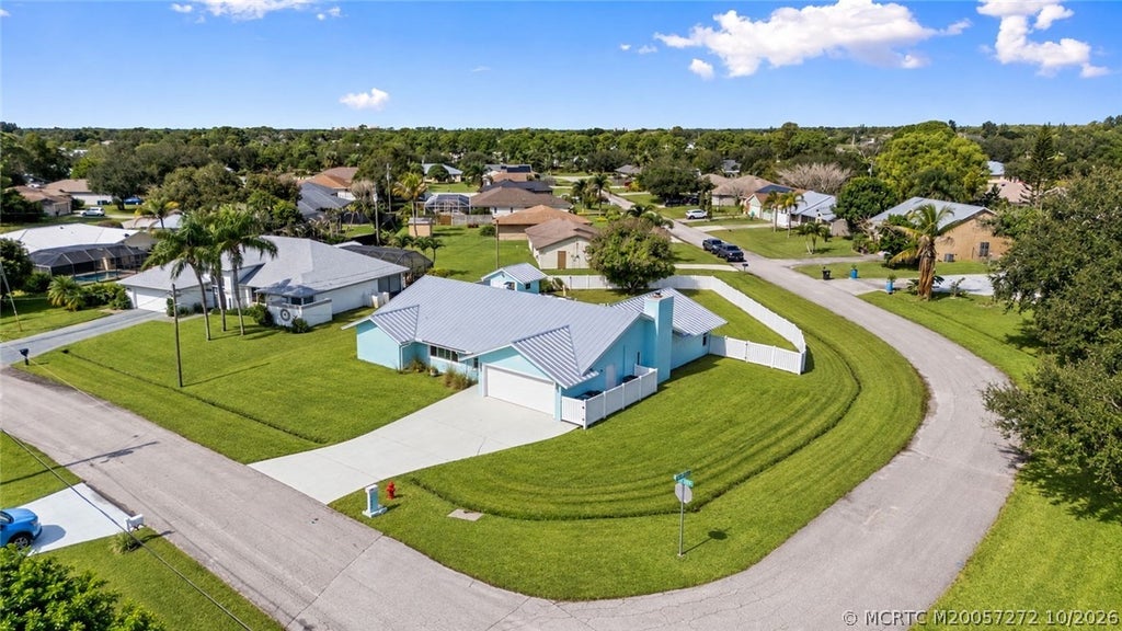 Photo of 1602 SE Flintlock Road, Port Saint Lucie, FL 34952 (MLS # M20057272)