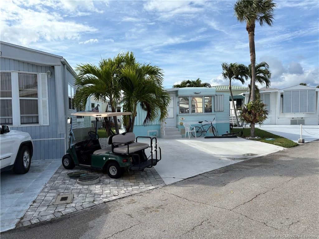 Photo of 975 Nettles Boulevard, Jensen Beach, FL 34957 (MLS # M20053357)