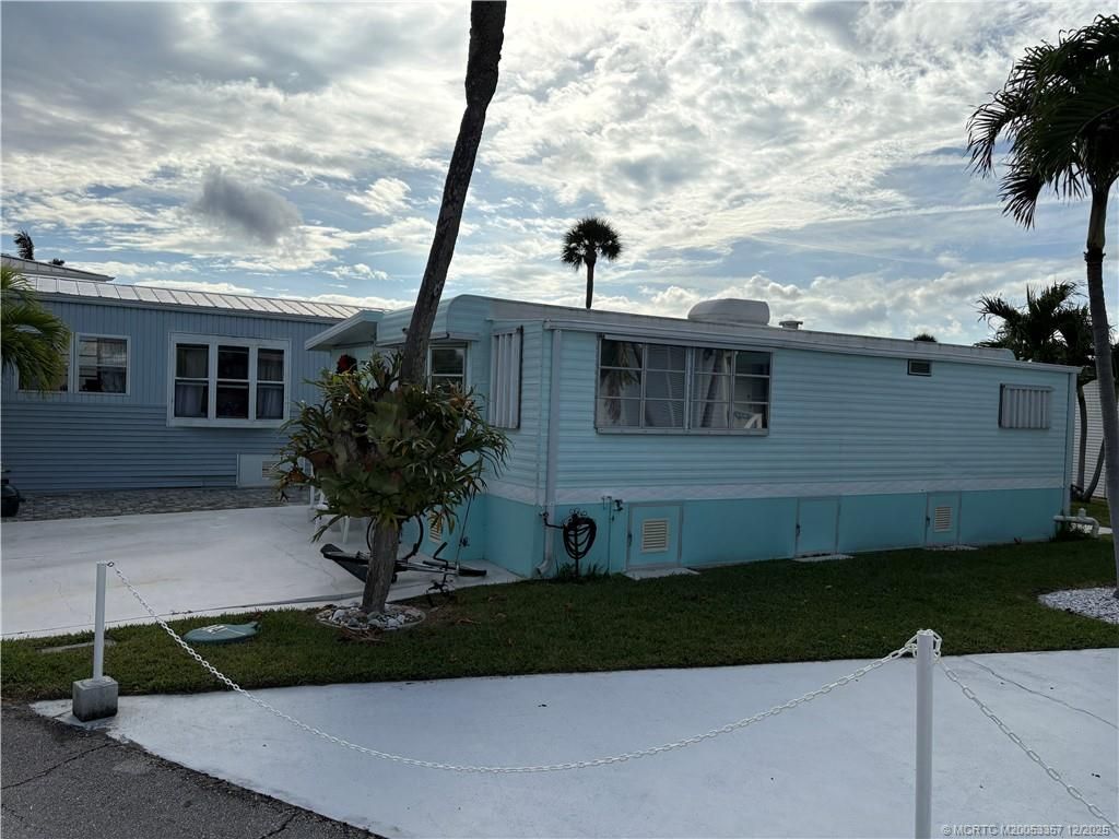 Photo of 975 Nettles Boulevard, Jensen Beach, FL 34957 (MLS # M20053357)