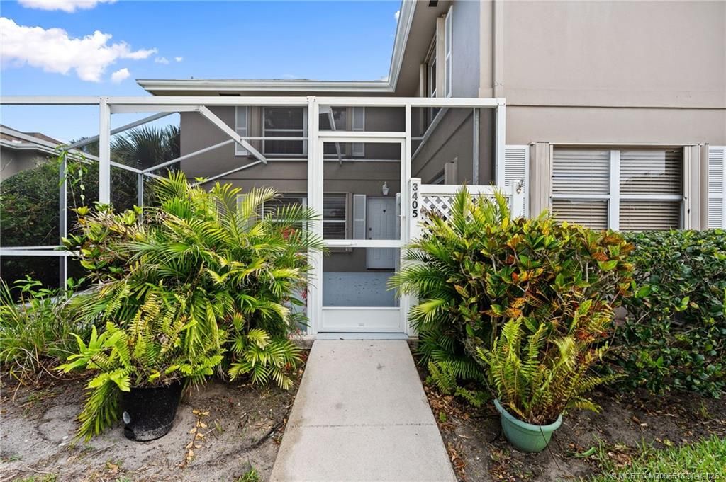 Photo of 3405 SW Sunset Trace Circle, Palm City, FL 34990 (MLS # M20055182)