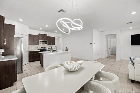 Photo of 1723 NE White Pine Terrace, Jensen Beach, FL 34957 (MLS # M20053736)