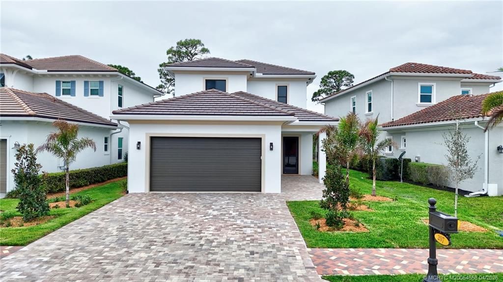 Photo of 207 SE Via Bisento, Port Saint Lucie, FL 34952 (MLS # M20054658)