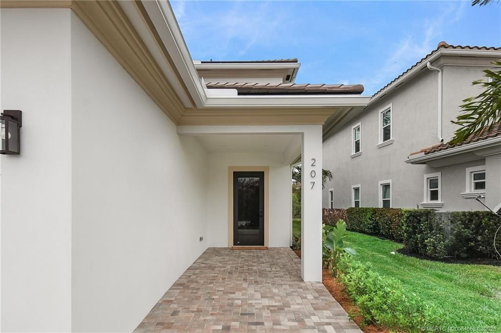 Photo of 207 SE Via Bisento, Port Saint Lucie, FL 34952 (MLS # M20054658)