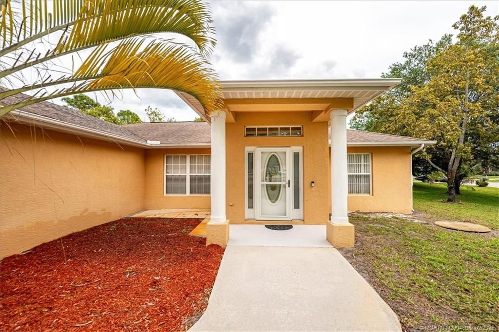 Photo of 2181 SW Brisbane Street, Port Saint Lucie, FL 34984 (MLS # M20048967)