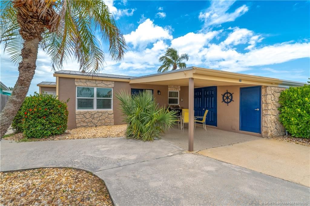 Photo of 48 Aqua Ra Drive, Jensen Beach, FL 34957 (MLS # M20051562)