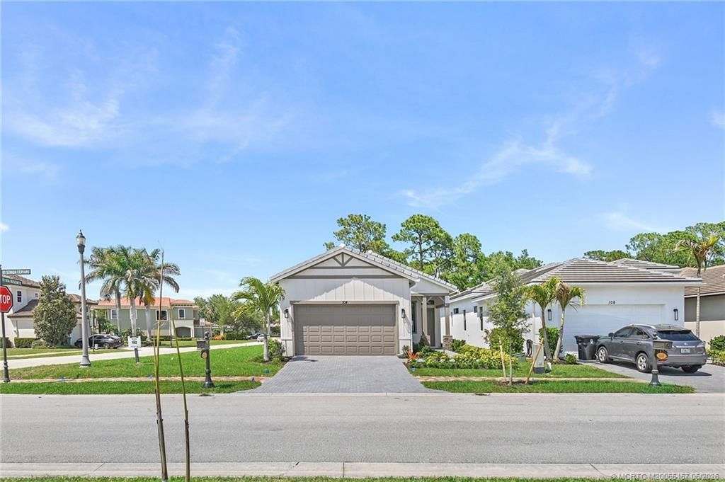 Photo of 104 SE Strada Cervaro, Port Saint Lucie, FL 34952 (MLS # M20055457)